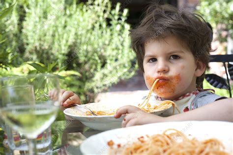 Messy toddler eating spaghetti - Stock Image - F009/9155 - Science ...