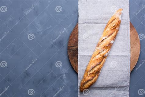 Fresh French Crisp Bread on Wood Round Board. Concept for Bunner, Top View on Grey Background ...