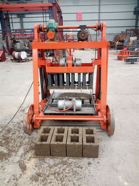 Portable concrete hollow block egg laying machine price | Concrete blocks, Brick molding ...