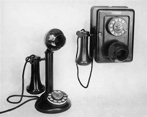 Two Old-fashioned Telephones by Authenticated News