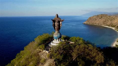 Download Majestic View of Cristo Rei Statue in Timor Leste Wallpaper ...