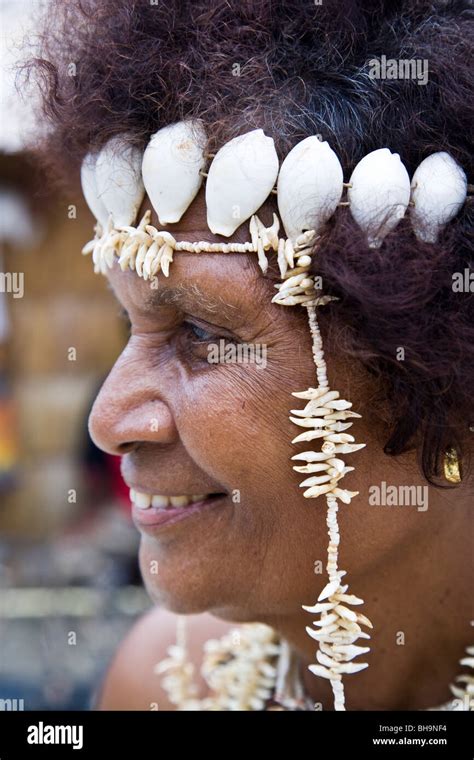 Close up of Melanesian woman wearing traditional shell head dress Stock Photo - Alamy