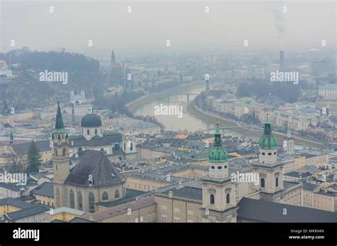 AAerial view of beautiful salzburg castle and river during winter and ...