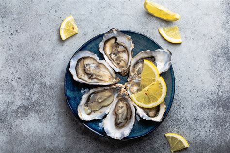 Fresh opened oysters featuring oyster, seafood, and top view | Food Images ~ Creative Market