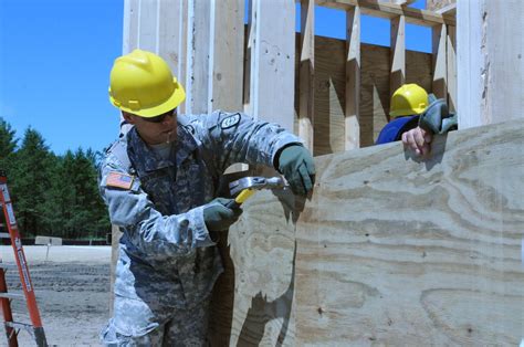 DVIDS - News - Horizontal and vertical Engineer Soldiers build training ...