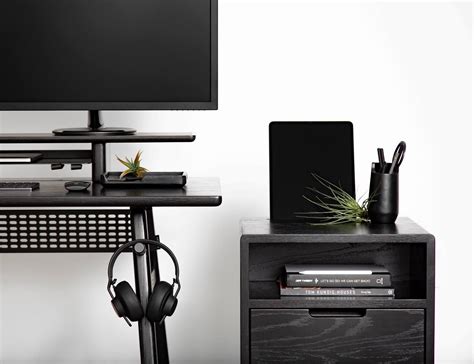 This Side Table with Storage Organizes Your Mess of Cables