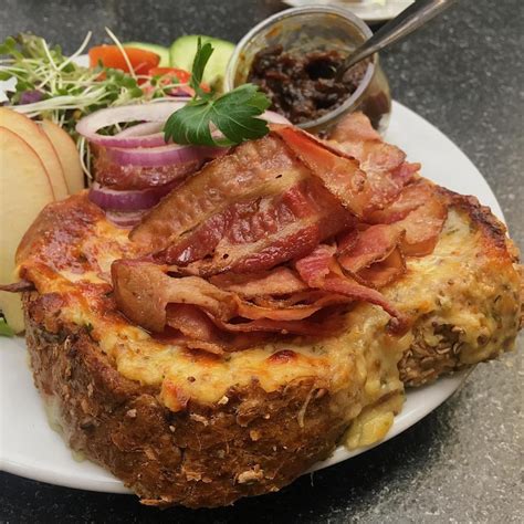 Some kind of food with Bacon on it. | Rarebit recipes, Recipes, Welsh ...