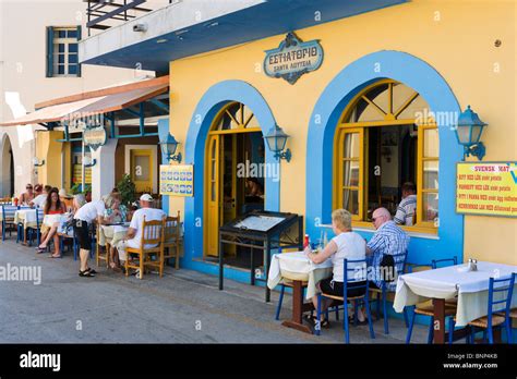 Traditional Greek Taverna near Elli Beach in Rhodes Town, Rhodes, Greece Stock Photo - Alamy