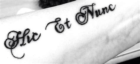 Latin script tattoo - here and now