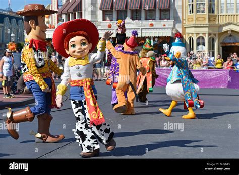 Woody and Jessie of Toy Story & other Disney Characters in a Parade ...