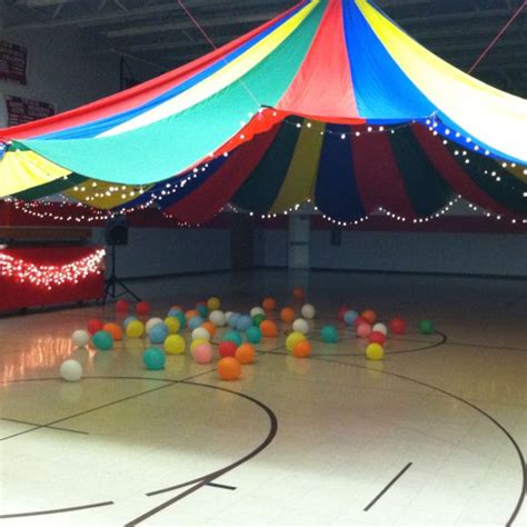 Middle school dance decorating idea.... Parachute hung from ceiling ...