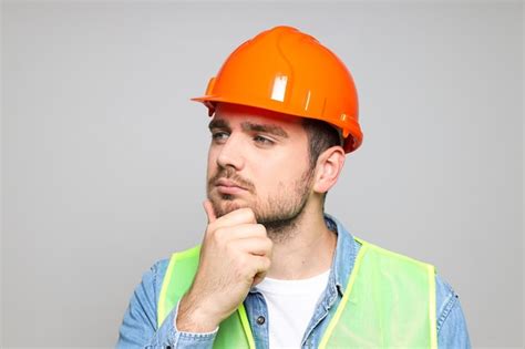 Premium Photo | Young man civil engineer in safety hat