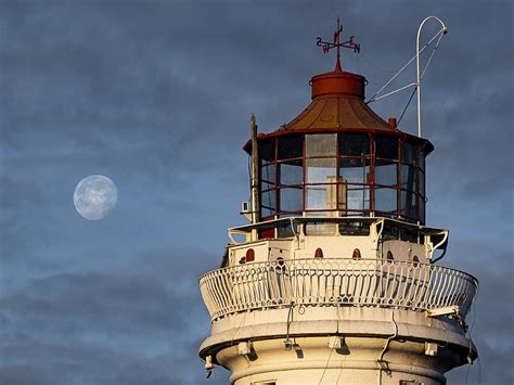 Sun Moon and Lighthouse by rburnage | ePHOTOzine