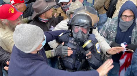 Watch Video: How Mob Dragged and Beat Police at Capitol - The New York Times