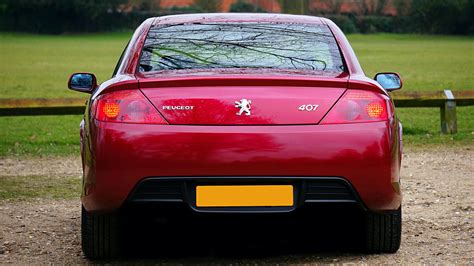 Red Peugeot 407 · Free Stock Photo