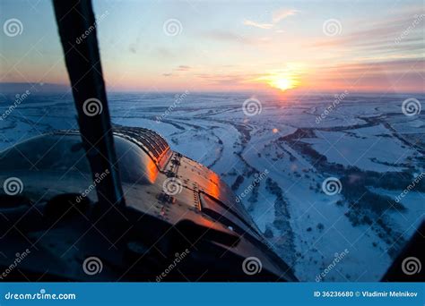 Looking from Cockpit of Old Airplane during Winter Sunrise Stock Photo ...