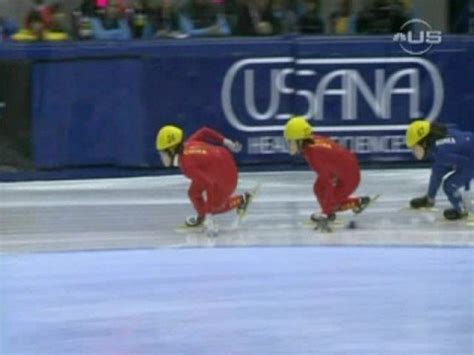 Speed skating crash as Wang wins - YouTube