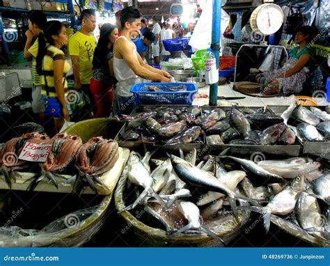 Meat And Fish Vendor In A Wet Market In Cubao , Quezon City ...