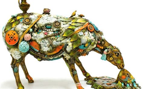 Steampunk sculptures of animals with exposed carved machinery ...