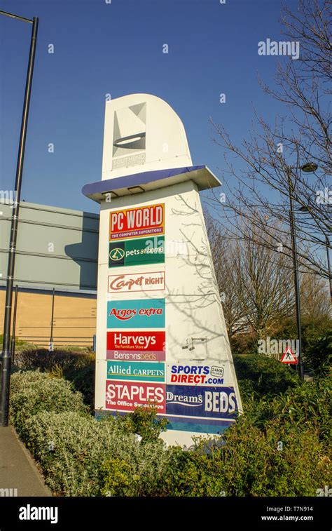 Sign at entrance to London Southend Airport retail park in the shape of a plane tail fin ...