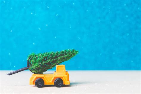 Christmas tree on a miniature car, Christmas season celebration concept ...