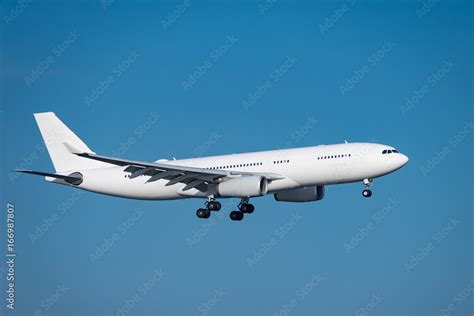 Airbus A330-200 landing Stock Photo | Adobe Stock