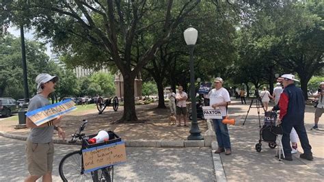 Few supporters, opponents of Paxton rally outside the Capitol