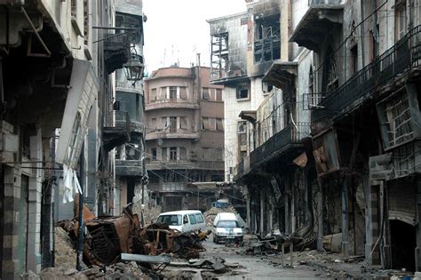 Bloodied and Bullet-holed: Rebels Leave Syrian City in Ruins - NBC News