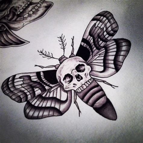 Huge skull-printed moth tattoo design - Tattooimages.biz