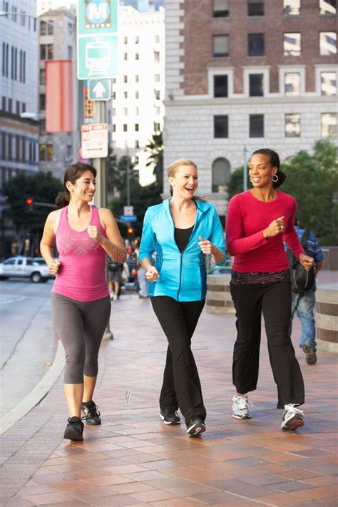 Group Of Women Power Walking On Urban Street Royalty Free Stock Photos ...