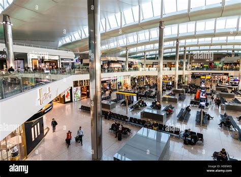 London, Heathrow airport, Terminal 2. Departure lounge interior. Overhead wide angle view of ...