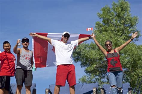 People Waving Flags in the Canada Day Parade Editorial Stock Image - Image of holding, canadian ...