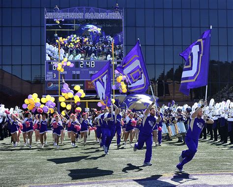 316497 | The WCU Cheerleaders lead the Catamounts onto the f… | Flickr