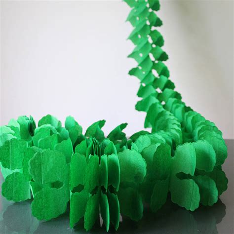 paper tissue garland decorations by pearl and earl | notonthehighstreet.com