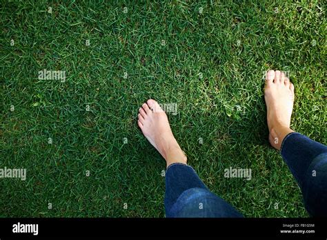 Barefoot woman grass hi-res stock photography and images - Alamy