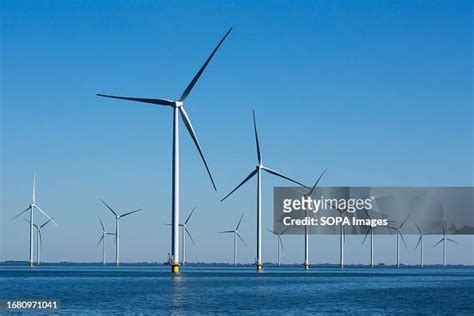 Wind turbines on the Fryslan Wind Farm at the IJsselmeer in... News ...