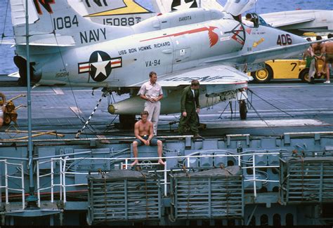 A-4 Skyhawk aircraft and crew on the deck of aircraft carrier USS Bon Homme Richard (CVA-31) on ...