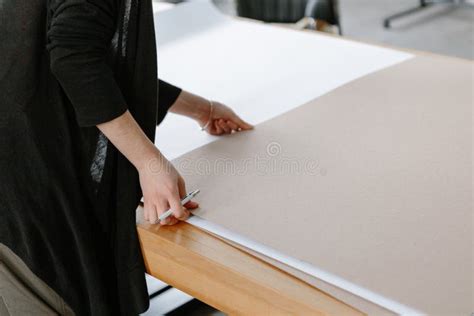 Female Hands are Drawing on a Large Wooden Table in the Loft Style in ...