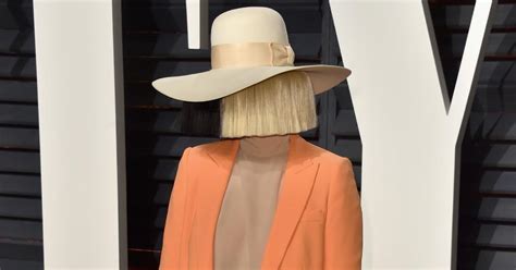 Why Does Sia Cover Her Face? Here's the Scoop