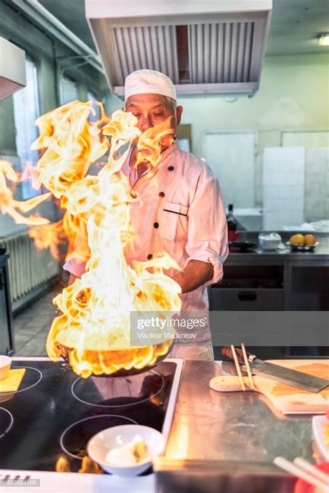 Chef cooking in asian restaurant. | Chinese restaurant, Chef, Restaurant photography