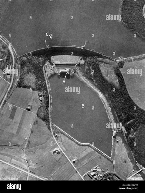 DAMS RAIDS - OPERATION CHASTISE. Aerial reconnaissance photo of the Mohne Dam before the attacks ...