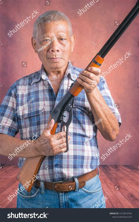 Portrait Elderly Asian Man Holding Shotgun Stock Photo 1913810764 ...