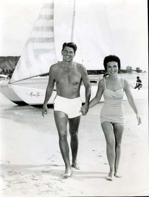 Ronald Reagan and his wife Nancy Reagan smile as they have their ...