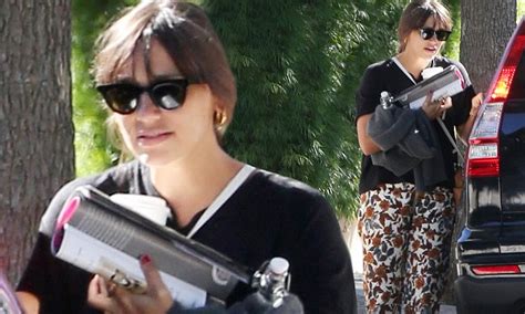 Rashida Jones has her hands full as she steps out after 'secret birth ...