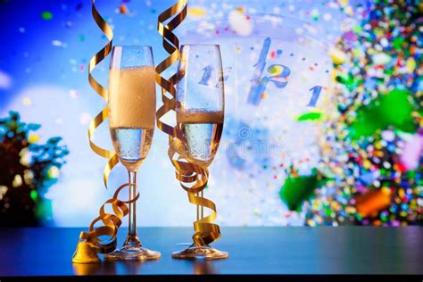 Two Champagne Glasses with Ribbons and Falling Confetti - New Year Celebrations Stock Image ...