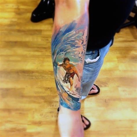 Abstract style colorful surfer in wave tattoo on arm - Tattooimages.biz