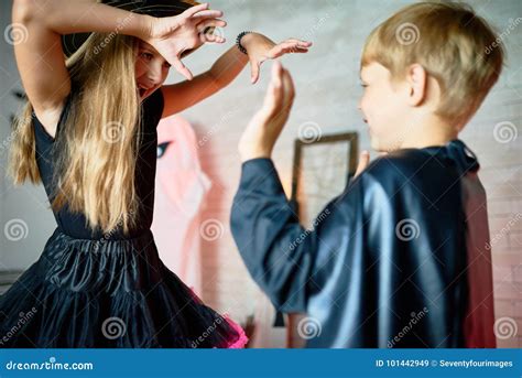 Girl Scaring Little Brother on Halloween Stock Image - Image of ...