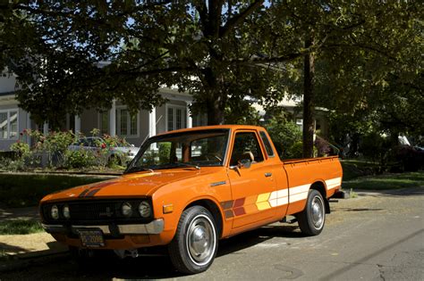 OLD PARKED CARS.: 1978 Datsun 620 King Cab.