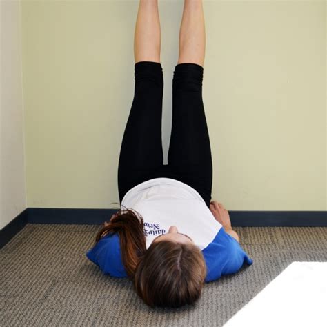 9 Easy Stretches to Relieve Back Pain: Wall Hamstring Stretch | RxWiki