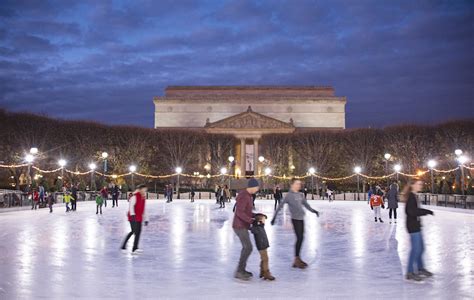 Couple Ice Skating At Night